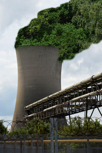 View of factory against sky