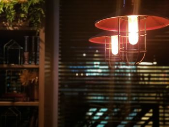 Low angle view of illuminated light bulb