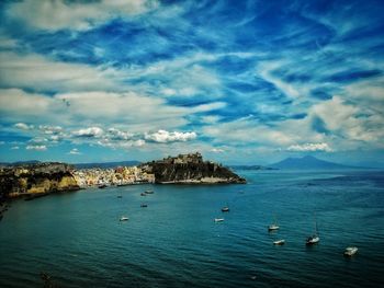 Scenic view of sea against blue sky