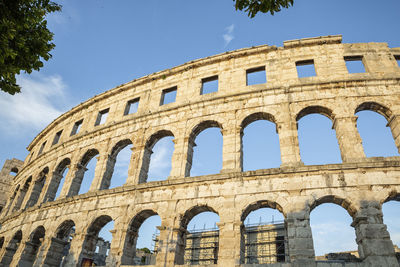 Low angle view of historical building against sky