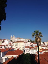 Low angle view of buildings against blue sky