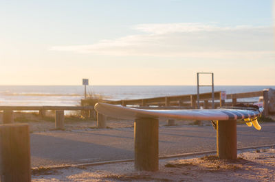 Scenic view of beach against sky during sunset