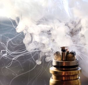 Close-up of smoke emitting from electronic cigarette