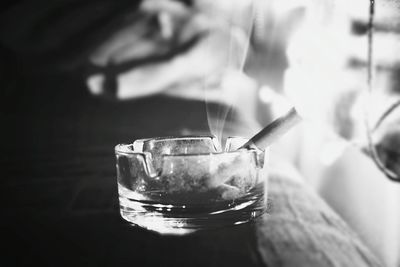 Close-up of cigarette in ashtray