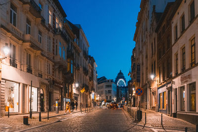 Nightlife in brussels. people strolling through the streets of belgiums capital