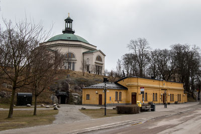 Road with buildings in background