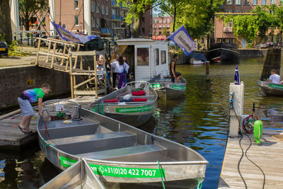 Boats moored in canal