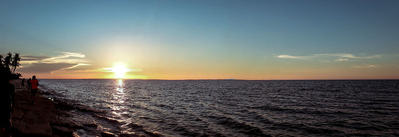 Scenic view of sea during sunset