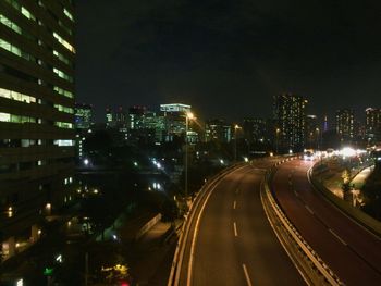 Aerial view of illuminated city at night