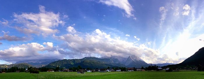 Landscape with mountain range in background