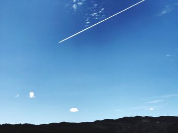 Low angle view of vapor trail in sky