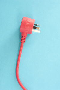 Close-up of telephone booth against blue background