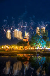 Firework display at night