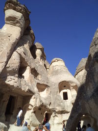 Low angle view of built structure against clear blue sky