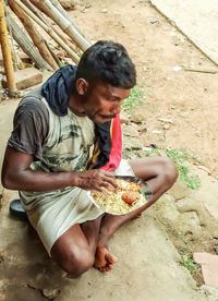 High angle view of man preparing food