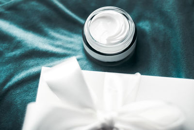 High angle view of wedding rings on table