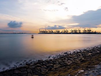 Scenic view of sea against sky during sunset