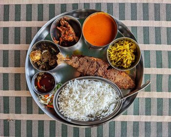 Goan fish curry rice thali platter
