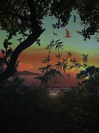 Scenic view of silhouette landscape against sky at sunset