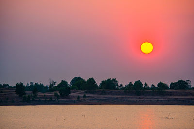 Scenic view of landscape against sky during sunset