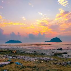 Scenic view of sea against sky during sunset