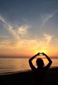Scenic view of sea at sunset