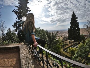 Side view of woman looking at view