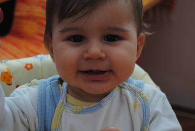 Portrait of cute baby at home