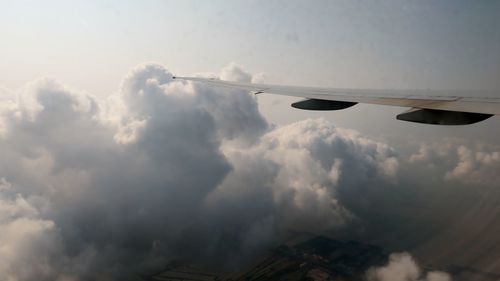 Airplane flying in sky