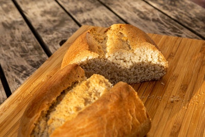 High angle view of bread on cutting board