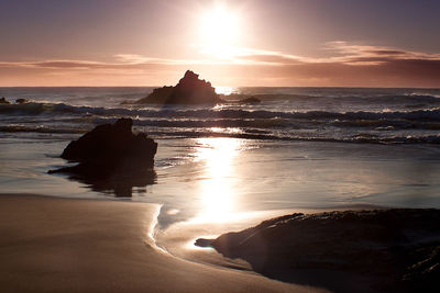 Scenic view of sea against sky during sunset