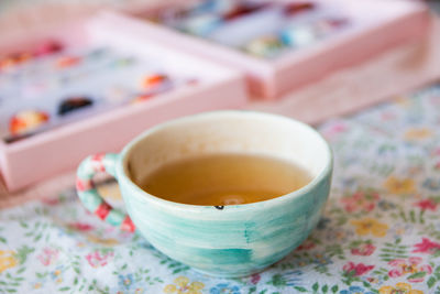 Close-up of tea cup on table