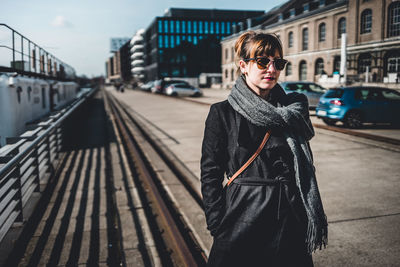 Portrait of a woman in a city