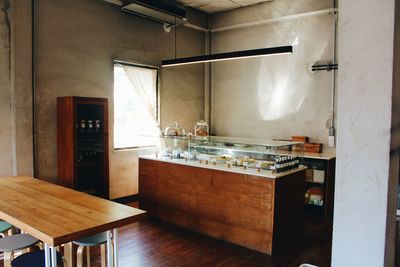 Empty chairs and tables in restaurant