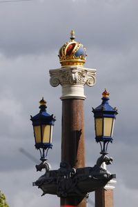 Low angle view of street light against sky