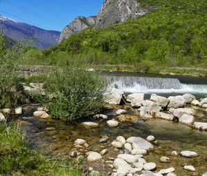 Scenic view of river stream against sky