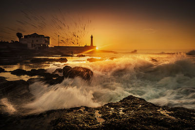 Scenic view of sea against sky during sunset