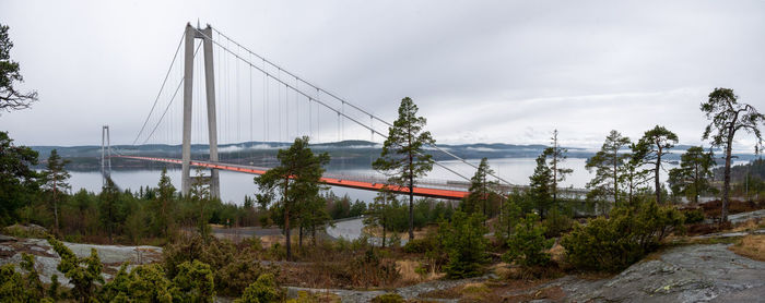 Bridge over bay against sky