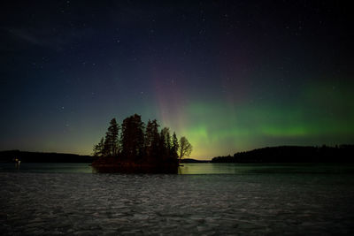 Northern lights at a lake in western sweden