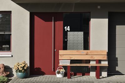 Potted plant on window of building