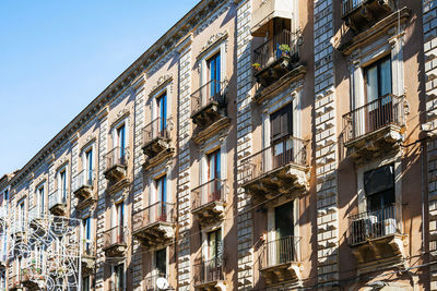 Low angle view of residential building against sky