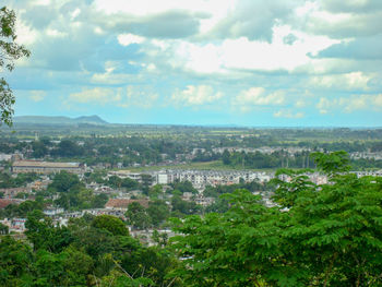 High angle view of buildings in city against sky