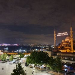 High angle view of city buildings at night