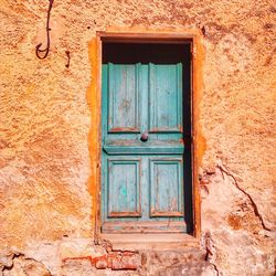 Close-up of closed door of house