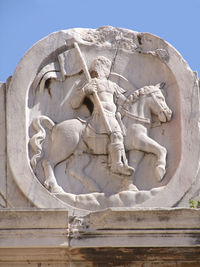 Low angle view of carved stone art