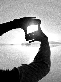 Midsection of man with text on water