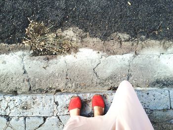 Low section of a woman standing outdoors