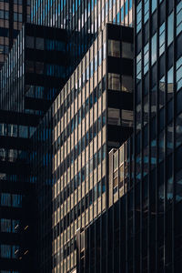 Low angle view of modern building in city