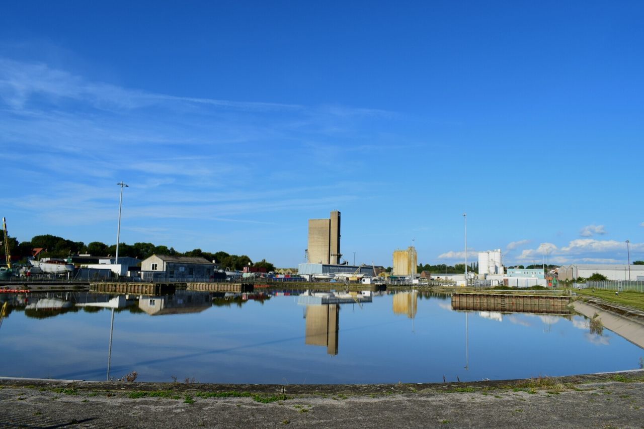 LAKE AGAINST BLUE SKY