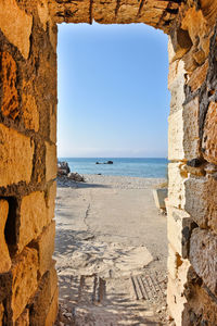 Sea view through ancient tunnel. cyprus island